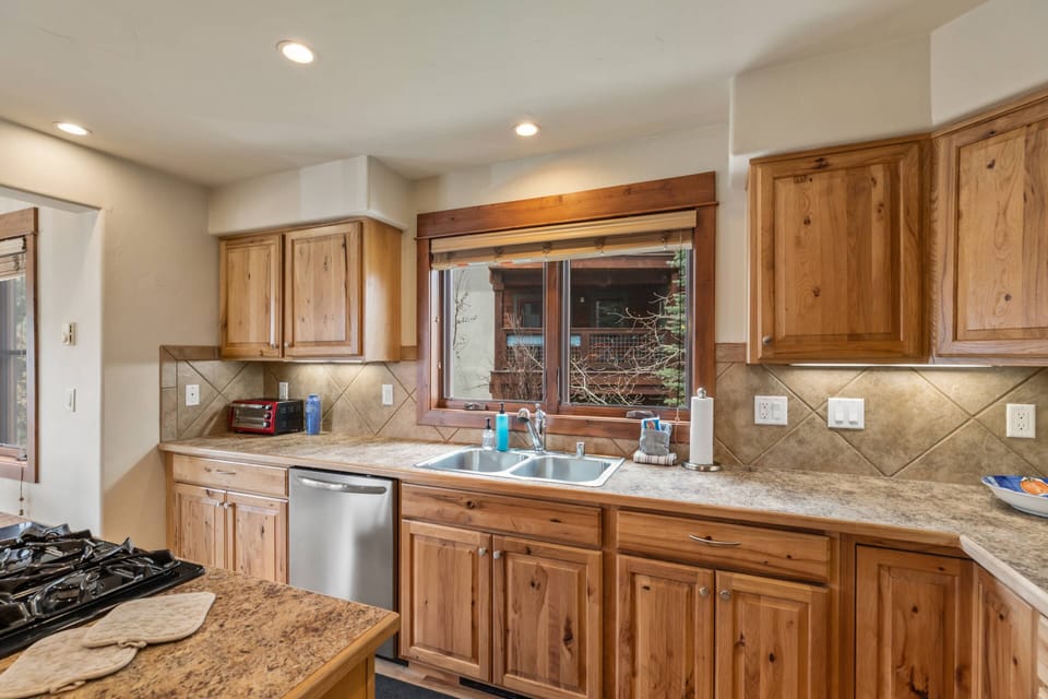 The kitchen offers ample counter space and everything you need to prepare a meal