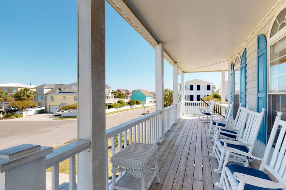 Sit on the large wrap around deck with plenty of seating