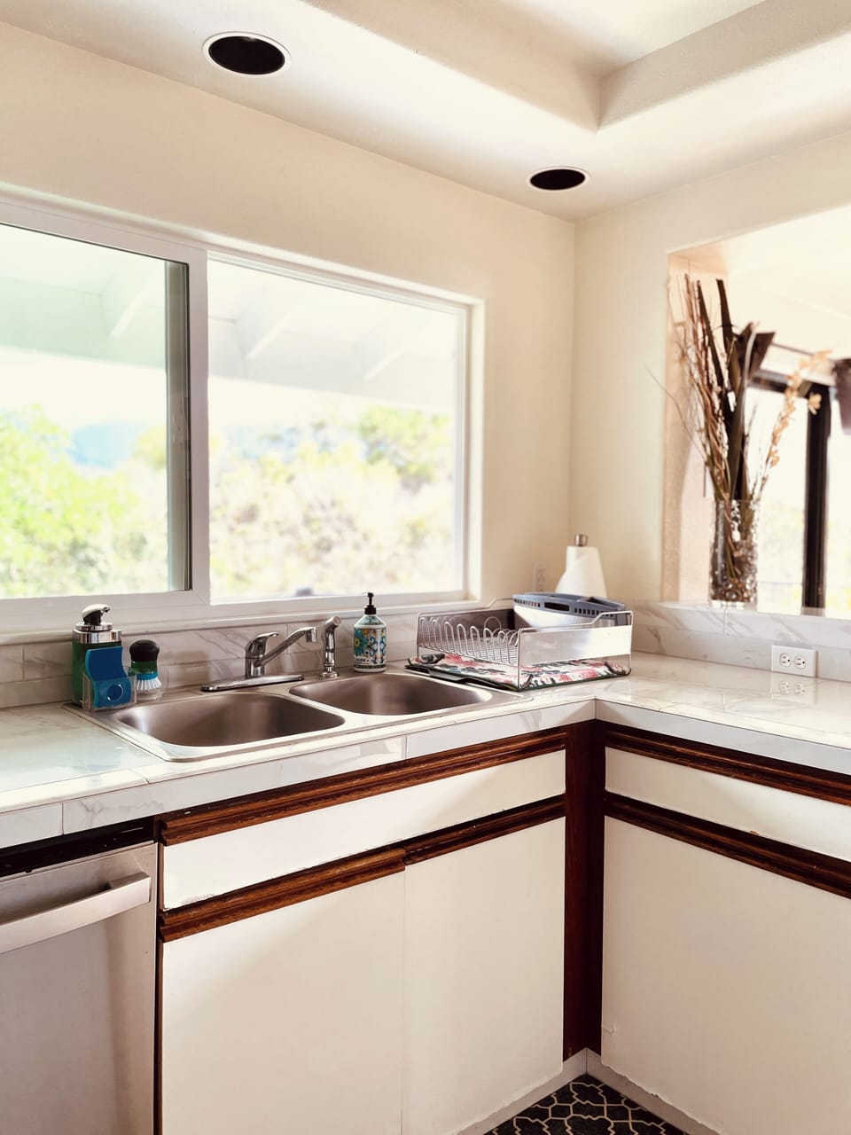 Kitchen fully stocked with cooking essentials and utensils.