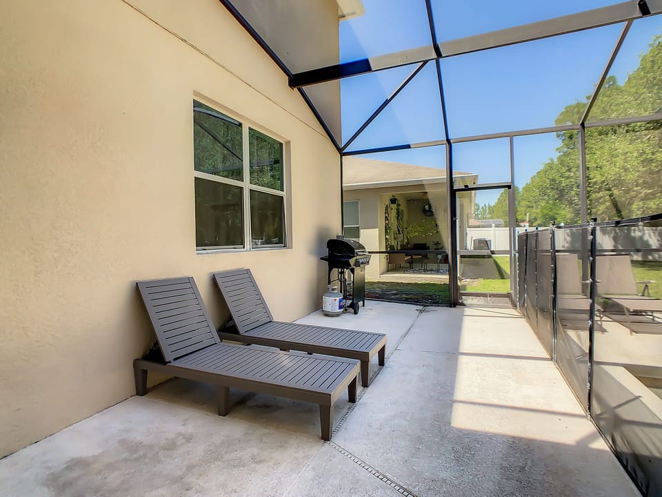 BBQ grill and loungers