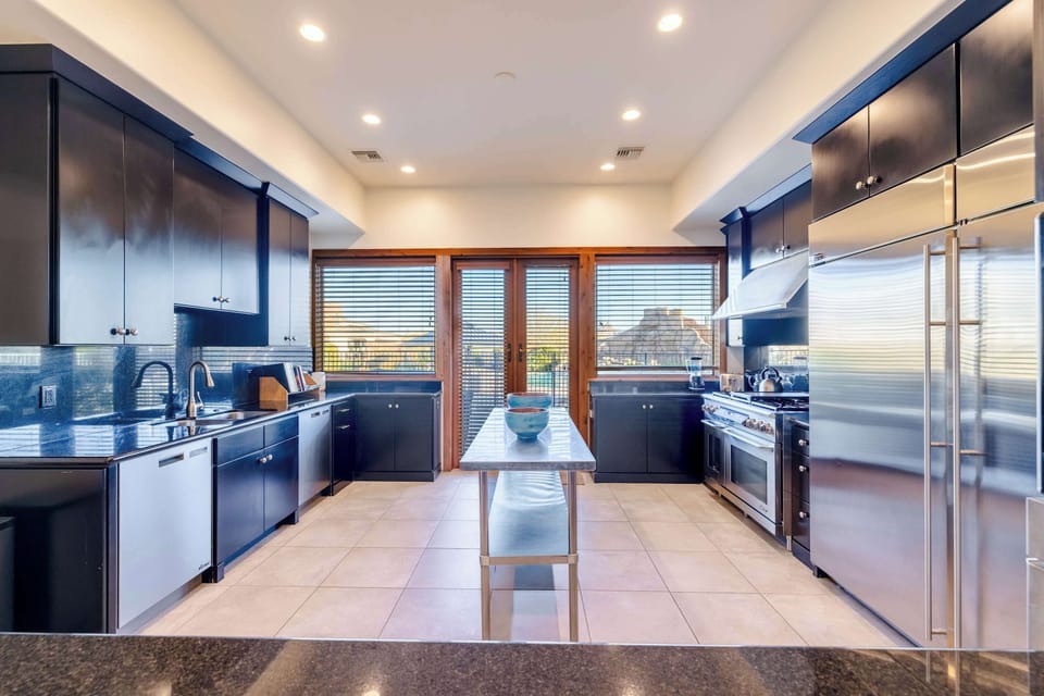 Chef's dream kitchen featuring Wolf appliances and Sub-Zero refrigeration