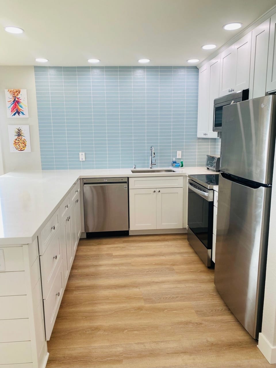 Kitchen with quartz counters and stainless steel appliances