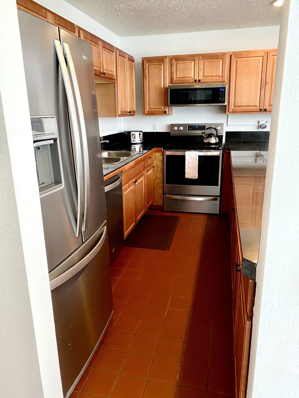 Kitchen with all new stainless steel appliances 
