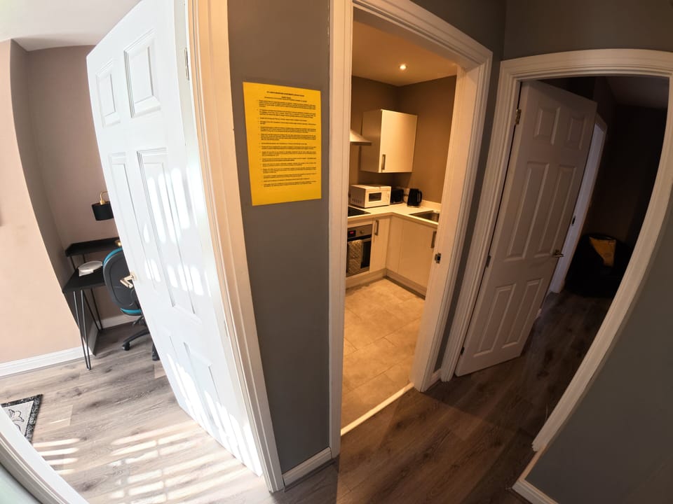 View of the apartment layout with separate bedroom, kitchen and living space.