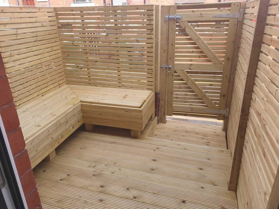 Private outdoor seating area, ideal for relaxing or enjoying a drink.