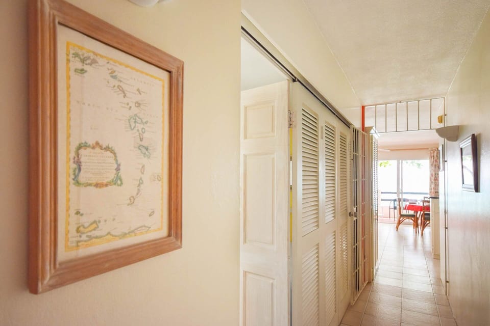 Hallway leading to living area and patio
