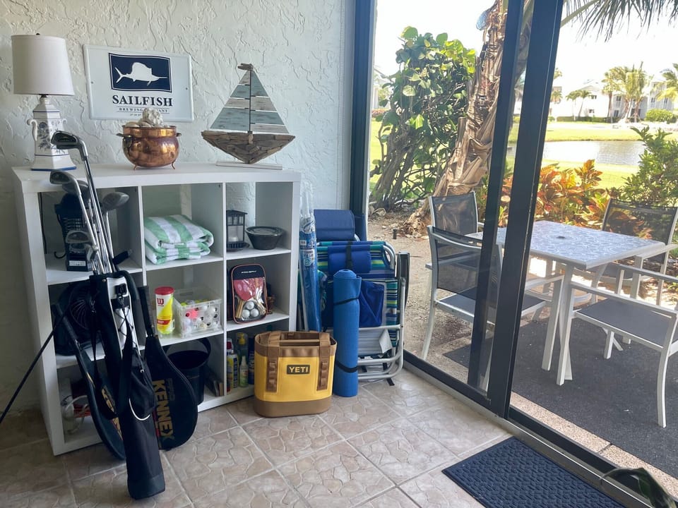 We have tennis rackets, golf clubs, Ping-pong rackets and balls, Beach, chairs, halogen lights, and coolers.