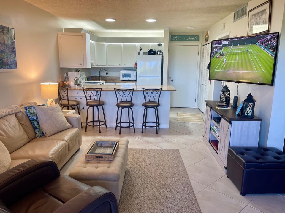 There's a granite countertop to sit at with a comfy seating area and pull-out sofa bed.