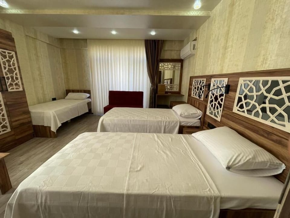 Classic Suite, 2 Bedrooms, City View | Minibar, blackout drapes, soundproofing, free WiFi