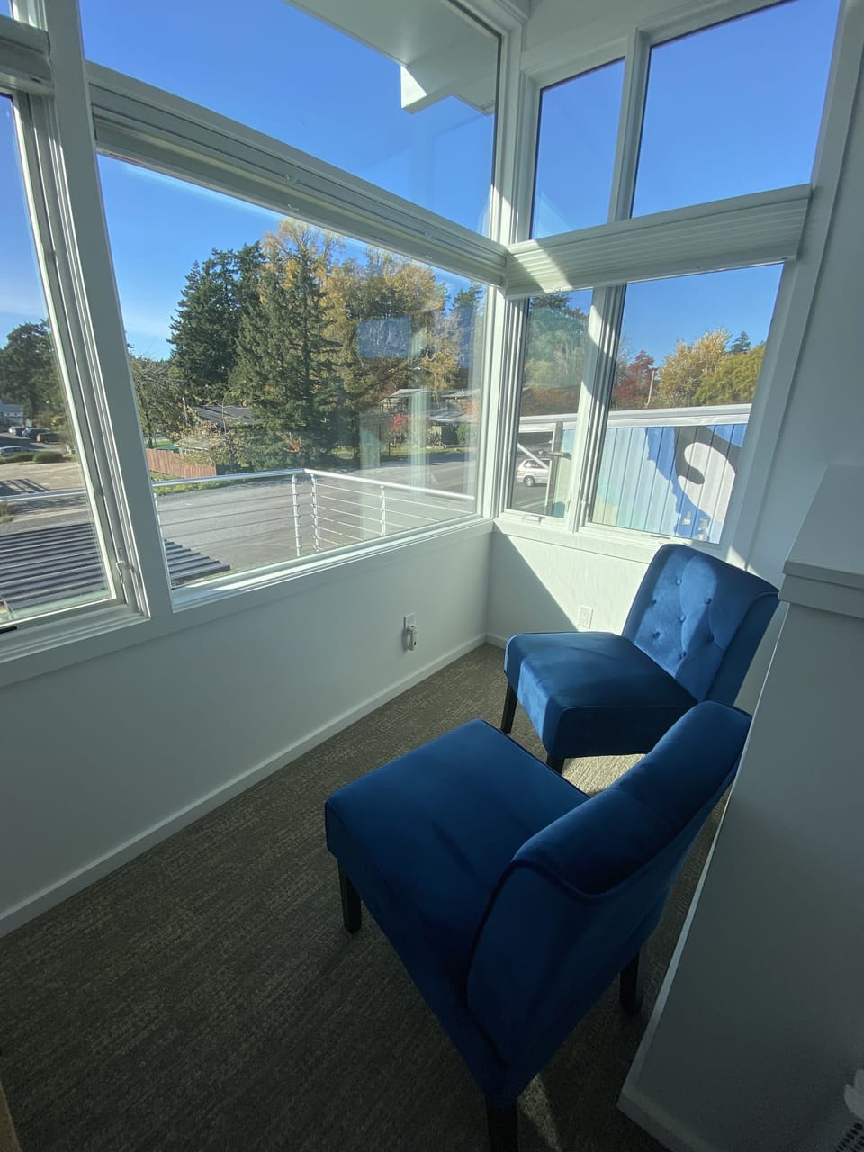 Rain or shine, this sitting nook offers  downtown and mountain view.