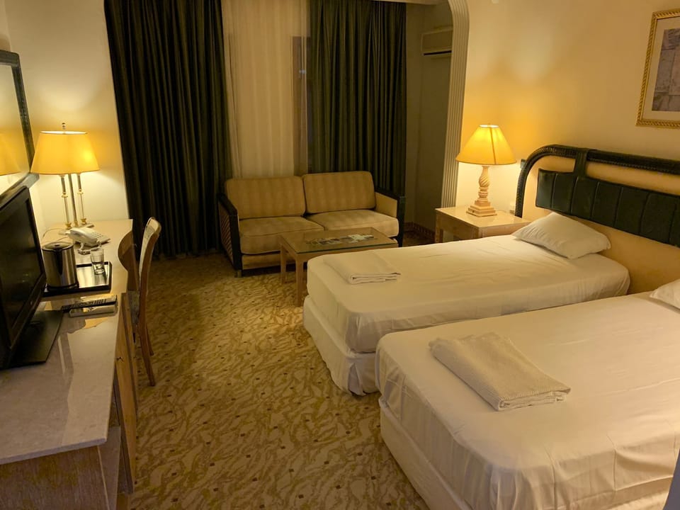 Minibar, desk, laptop workspace, blackout drapes