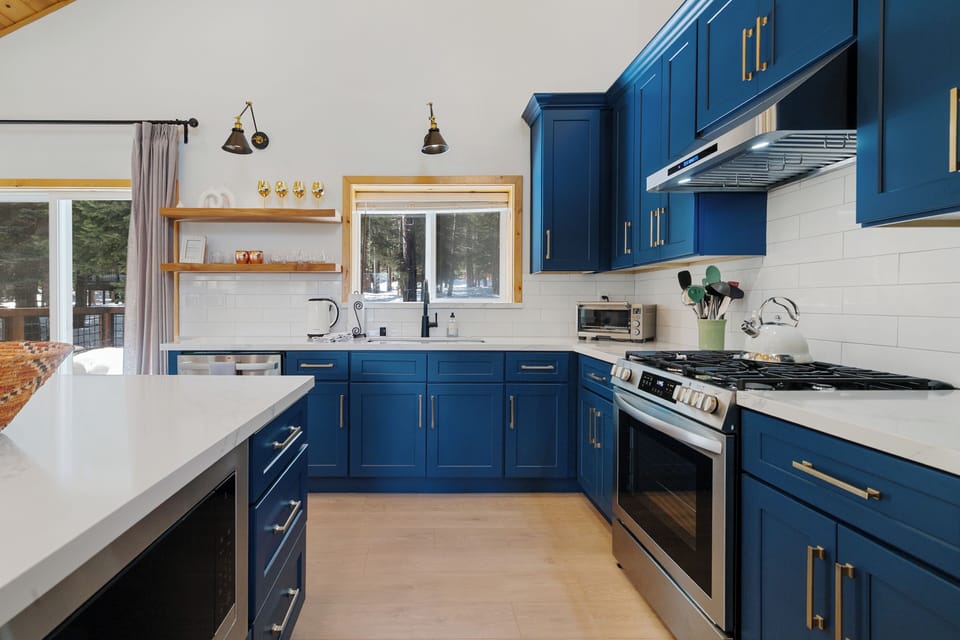 Enjoy a beautifully remodeled kitchen with marble counter tops, cobalt cabinets 