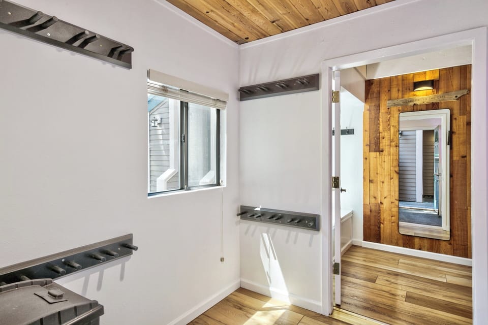 Sunlight streams through your windows into this bright, modern space with stunning wood accents and sleek steel details throughout.
