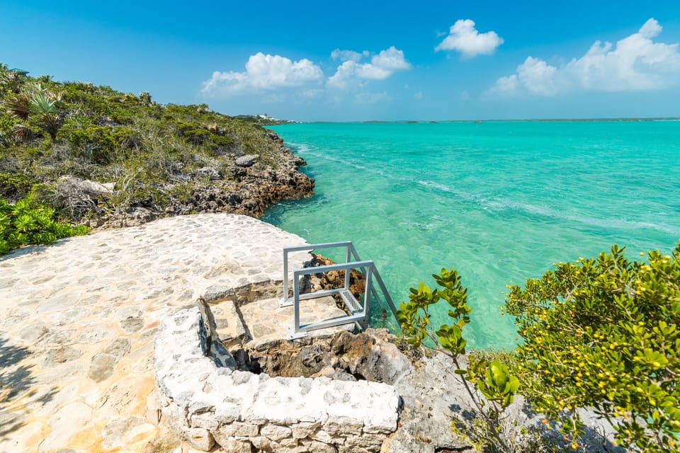 Swim platform on Chalk Sound-clear water, soft sandy bottom, about 3 feet deep