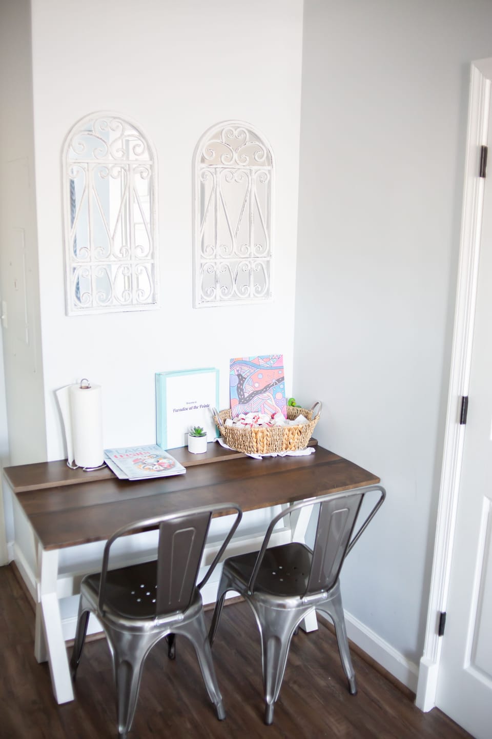 Kitchen table with rental booklet and additional information.