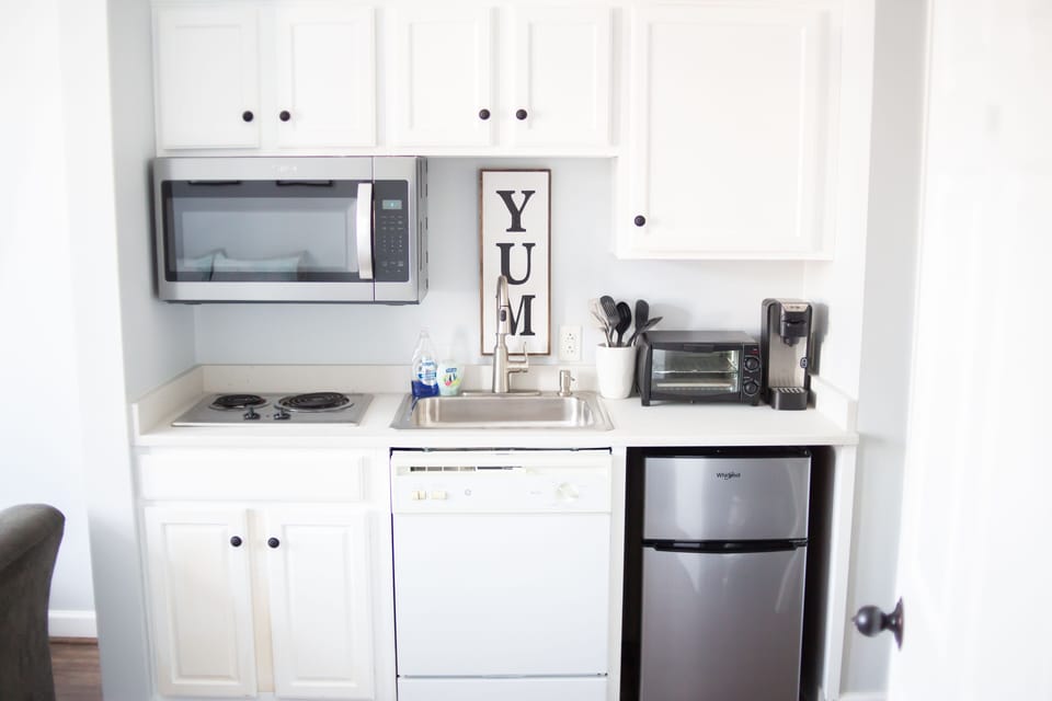 Kitchen area. Brand new Quartz countertops, sink, faucet, microwave (April 2023)