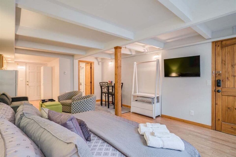 Let yourself relax and watch a movie in bed.