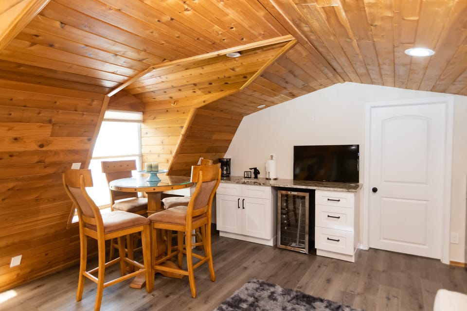 Dining space indoors and there's one outdoors too