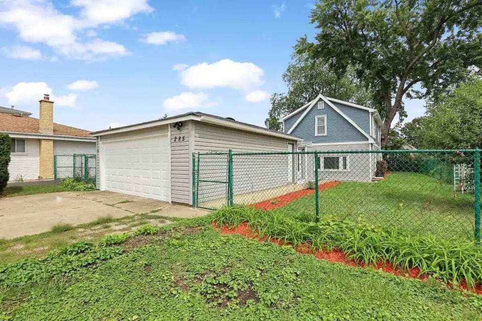 Private driveway and fenced yard