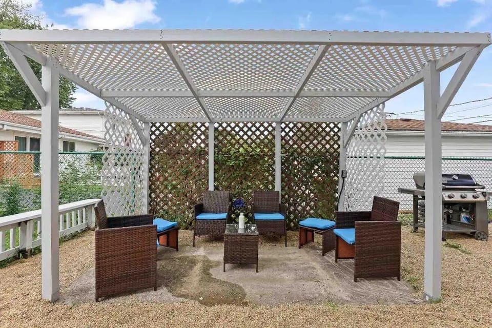 Outdoor seating and Weber gas grill