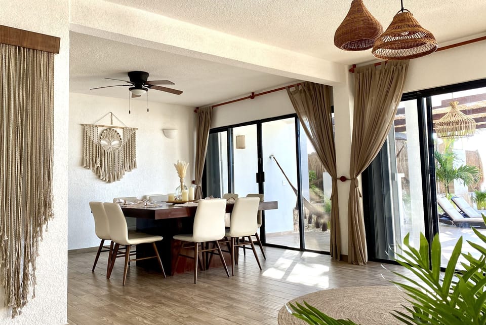 Dining room features a custom-made dining table for up to 12 guests.