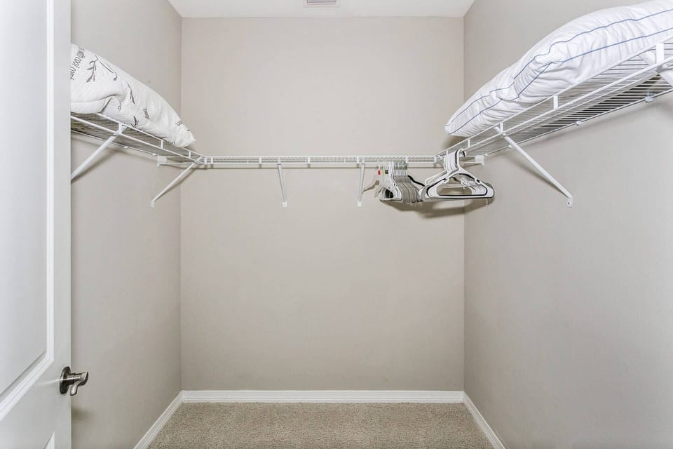 Huge walk-in closet in the master bedroom