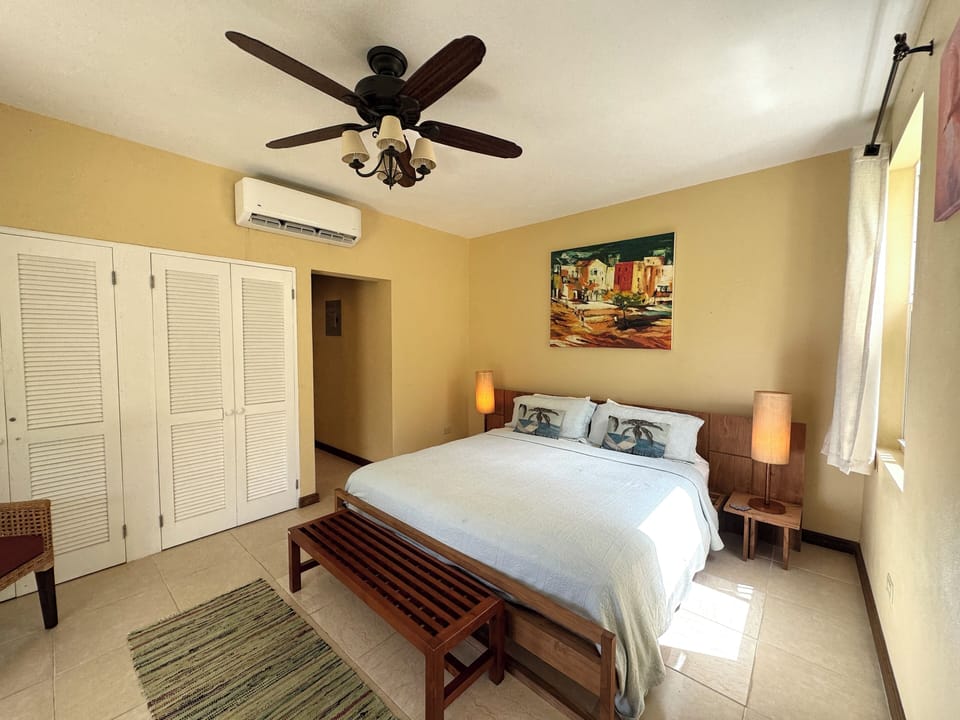 BEDROOM 4: has ensuite bathroom & leads out to the pool deck