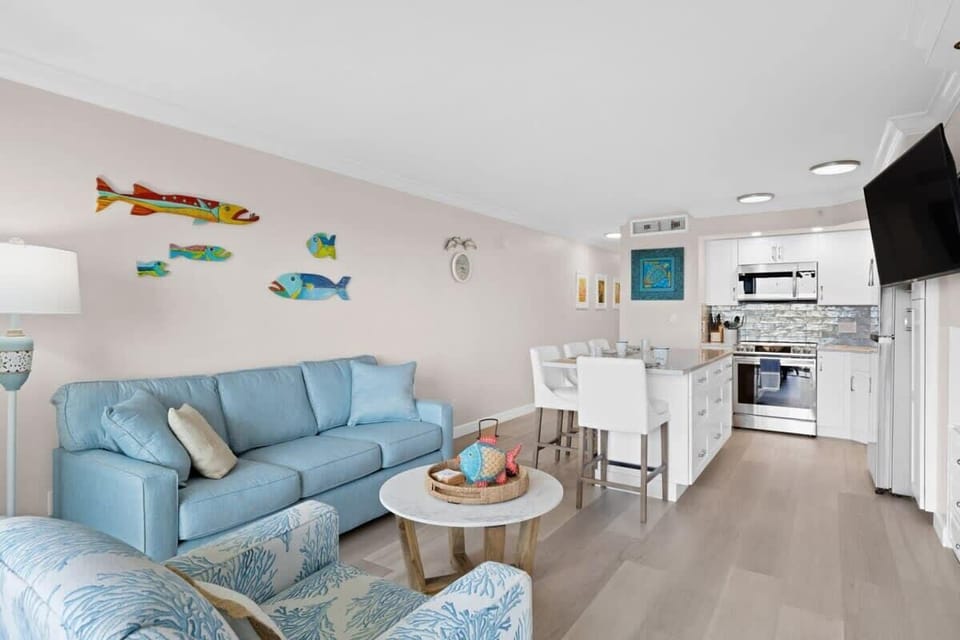 Updated living area with brand new furniture and ample seating