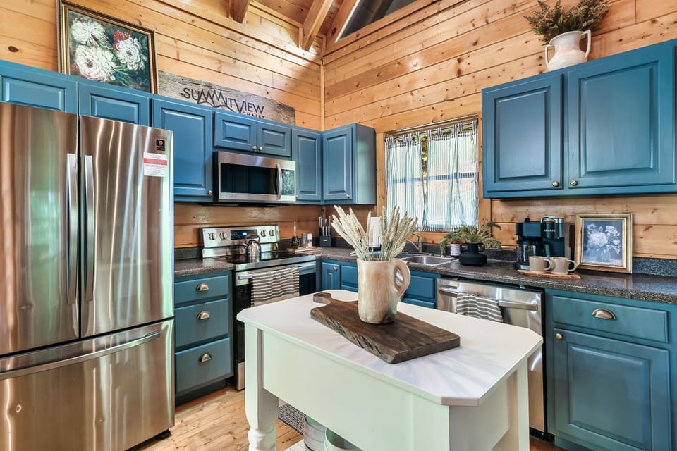 Fully stocked kitchen with everything you need for a comfortable stay.