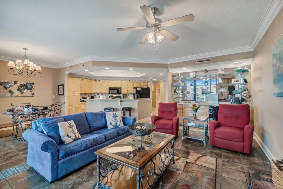 An elegant and comfortable living room, meticulously designed for relaxation. Enjoy sophisticated finishes and an airy feel in this welcoming space.