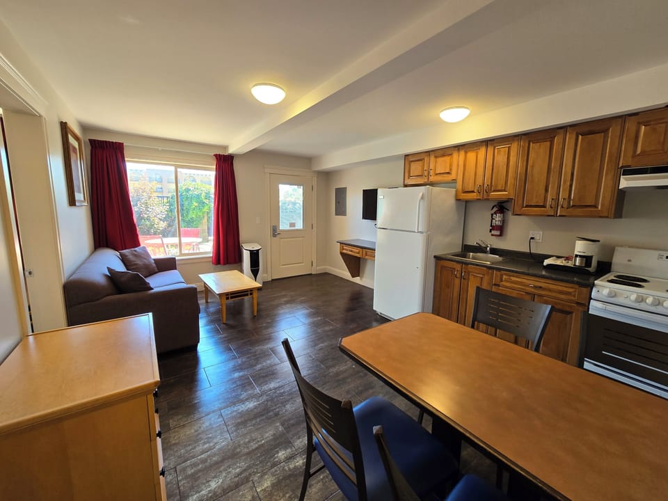 Two-Bedroom Suite | Living area | TV