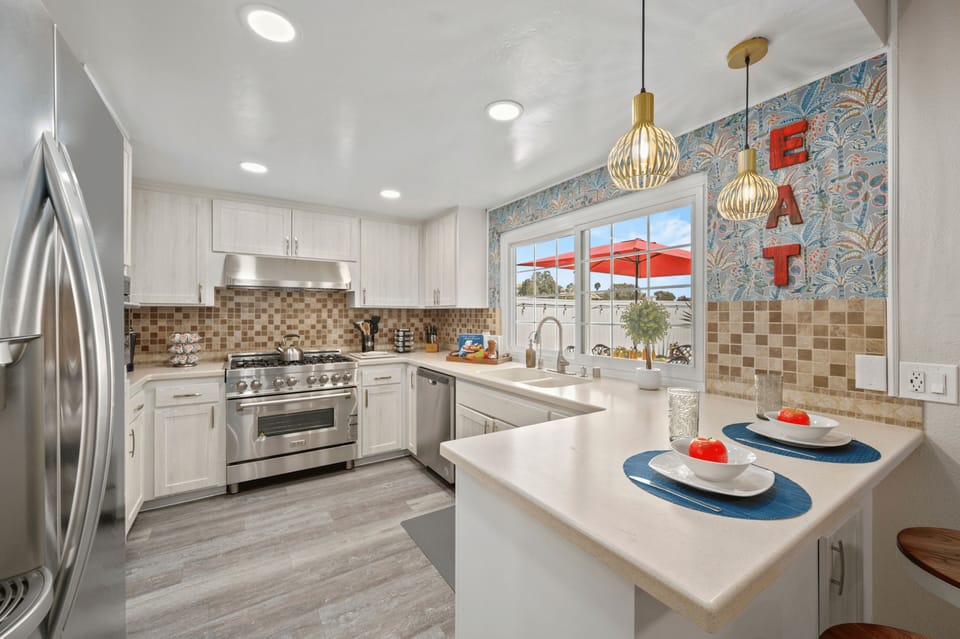 Impress your guests at this stylish kitchen with bar seating
