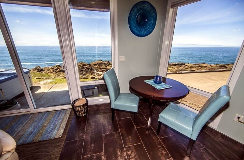 Window-side seating perfect for ocean watching & quiet moments