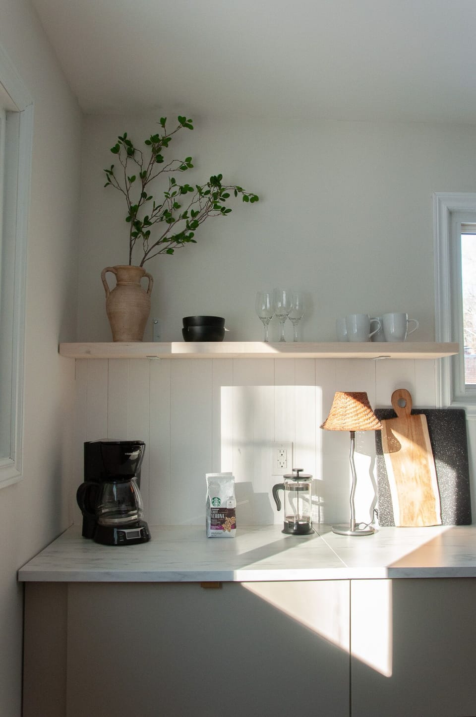 Coffee station with coffee maker, french press, and pour over available.