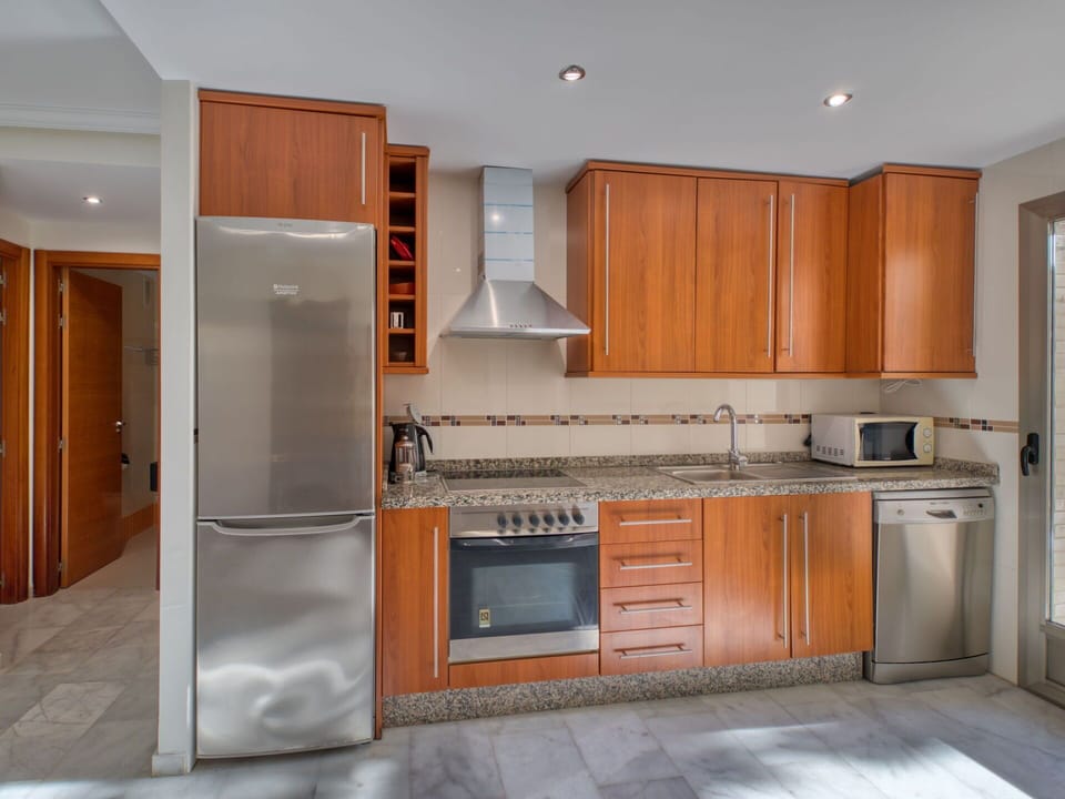 Cabinetry, Countertop, Building, Furniture, Kitchen Stove, Kitchen Appliance, Home Appliance, Kitchen, Wood, Orange