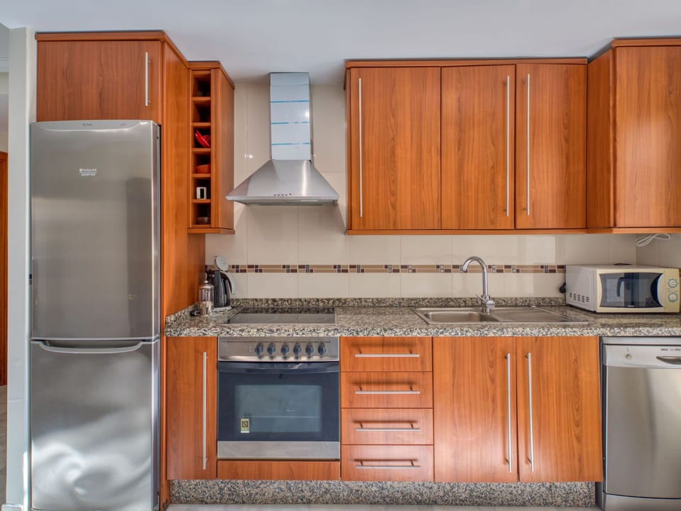 Cabinetry, Property, Countertop, Building, Kitchen Appliance, Kitchen Stove, Kitchen, Home Appliance, Interior Design, Wood