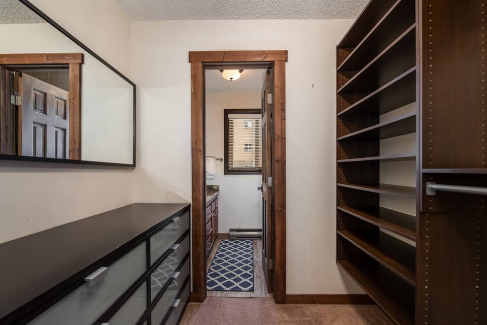Master bathroom with large closet area.