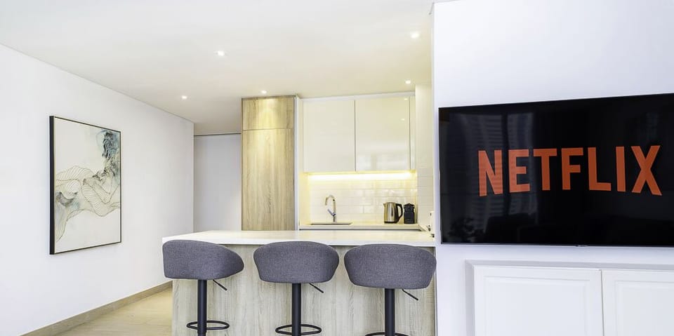 Deluxe Apartment | Private kitchen | Espresso maker, full-size fridge, microwave, oven
