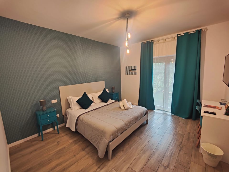 Exclusive Double Room, Accessible, Garden View (Ligea) | Premium bedding, down comforters, pillowtop beds, minibar