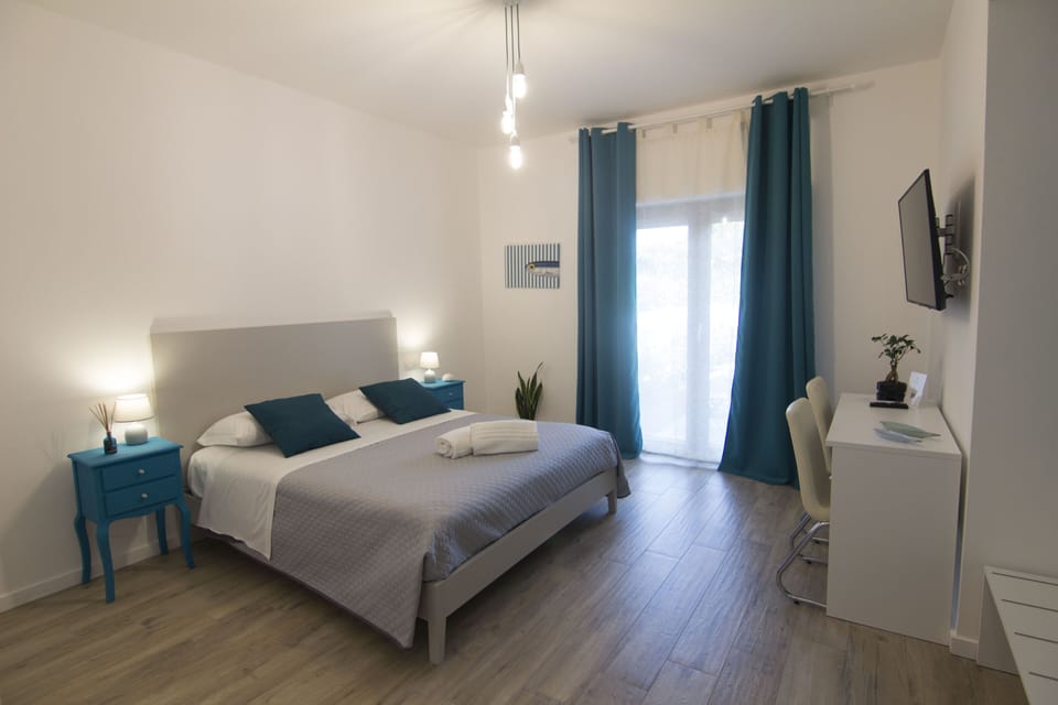 Exclusive Double Room, Accessible, Garden View (Ligea) | Premium bedding, down comforters, pillowtop beds, minibar