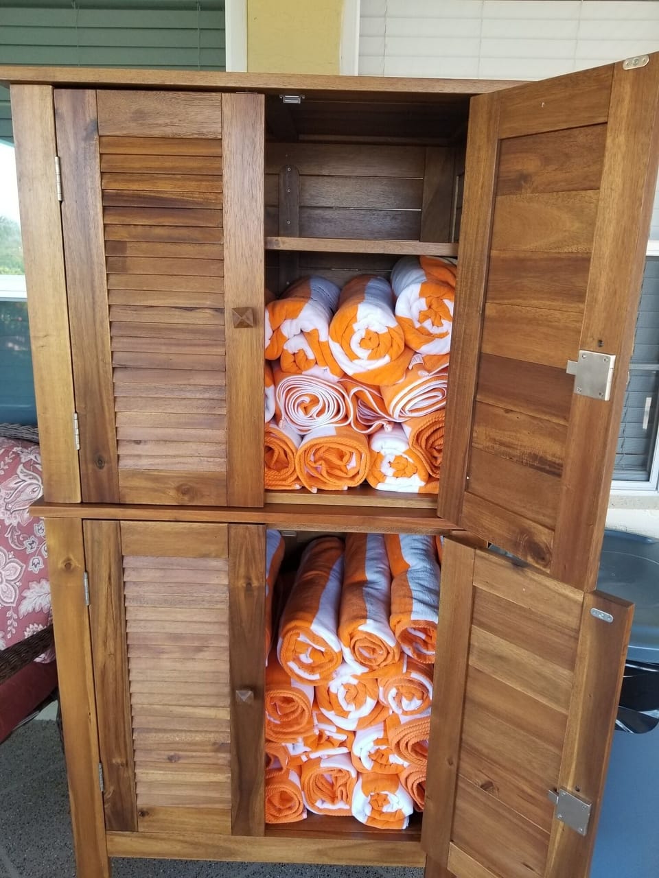 Cabana Cabinet with XL Beach Towels located in downstairs lanai