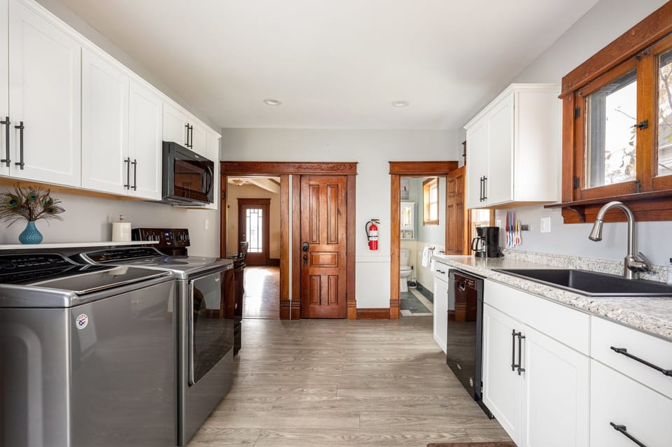 Updated kitchen w/ stainless appliances & long counters for prep