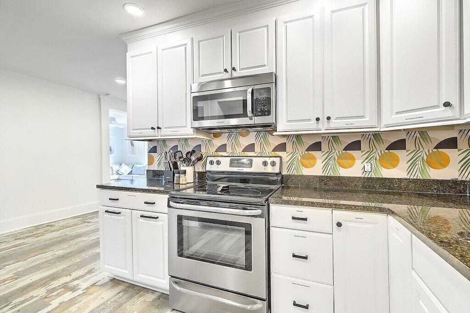 Kitchen opens to living room/dining room area
