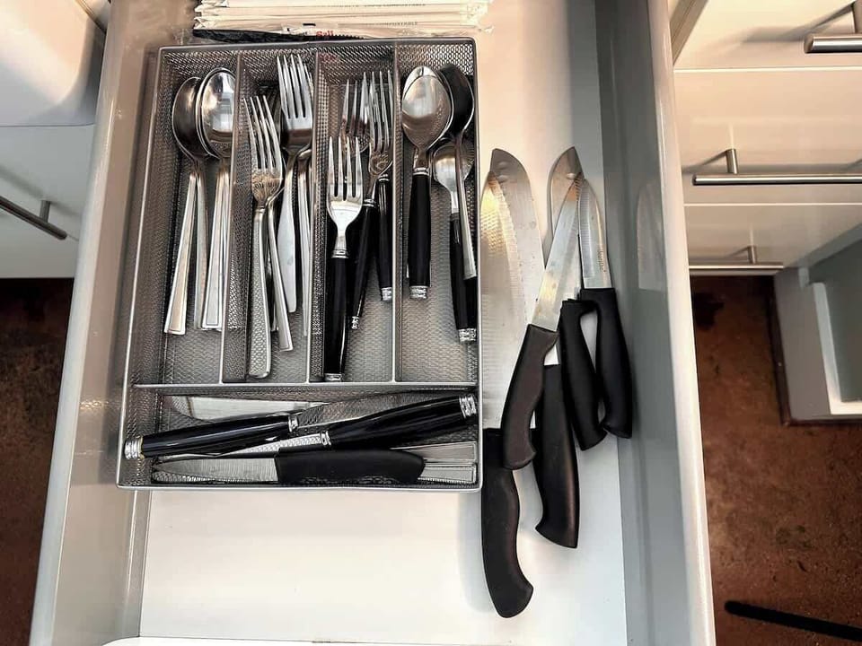 Drawer with utensils, knives, and kitchen tools