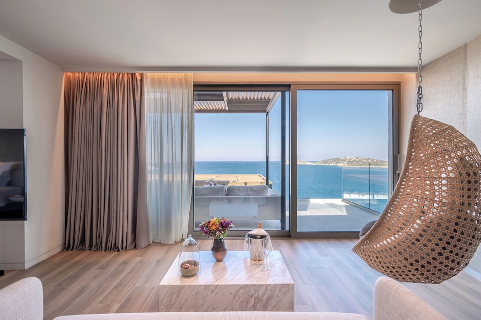 Superb Sea View Suite, Private Pool | Living area | 50-inch Smart TV with satellite channels, TV
