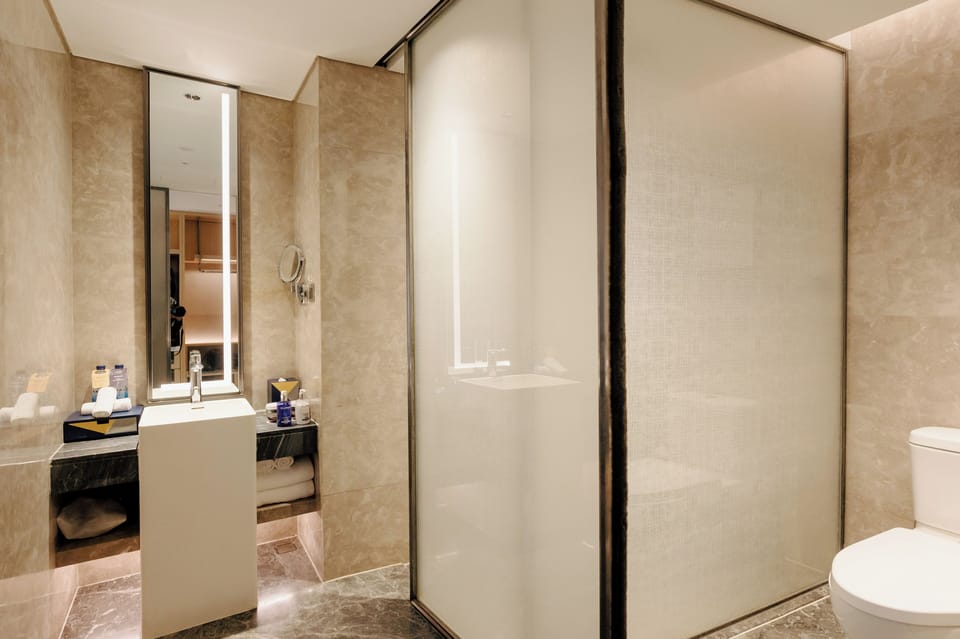 Rainfall showerhead, free toiletries, hair dryer, slippers