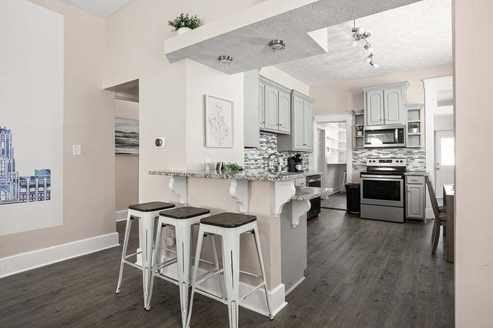 Pull up a seat at the bar and keep the chef in your group company