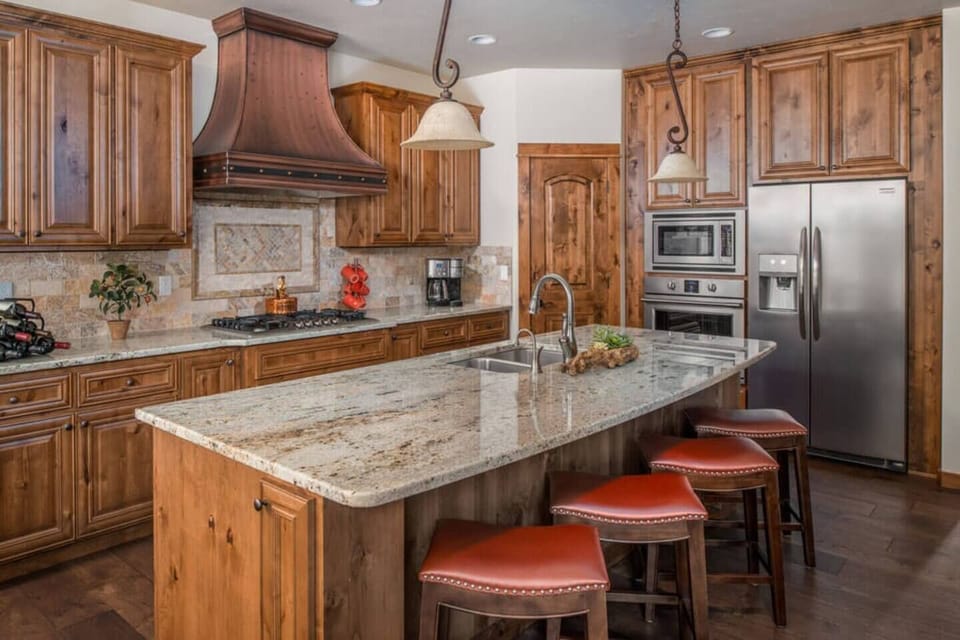 Fully equipped kitchen with gas range, oven, refrigerator, and microwave.  Your stay also includes complimentary Keurig coffee.