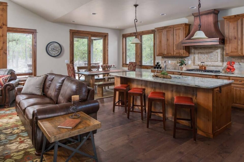 Open design kitchen, dining area, and great room makes it easy to bring family and friends together after the day exploring the beauty of Central Oregon.