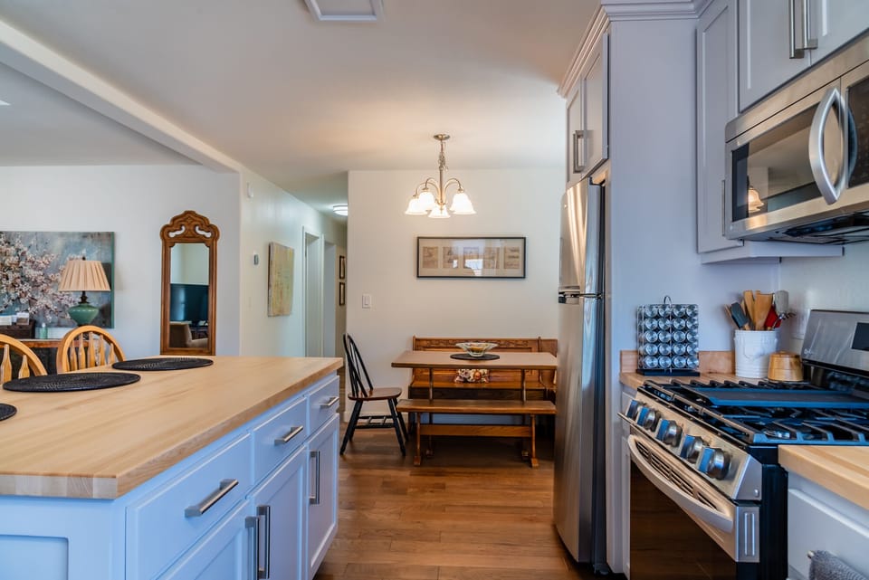 Kitchen - Our Kitchen includes our 5-Star Coffee Program, with ground coffee, Keurig pods, filters, sugar, and milk for your stay! What a value!